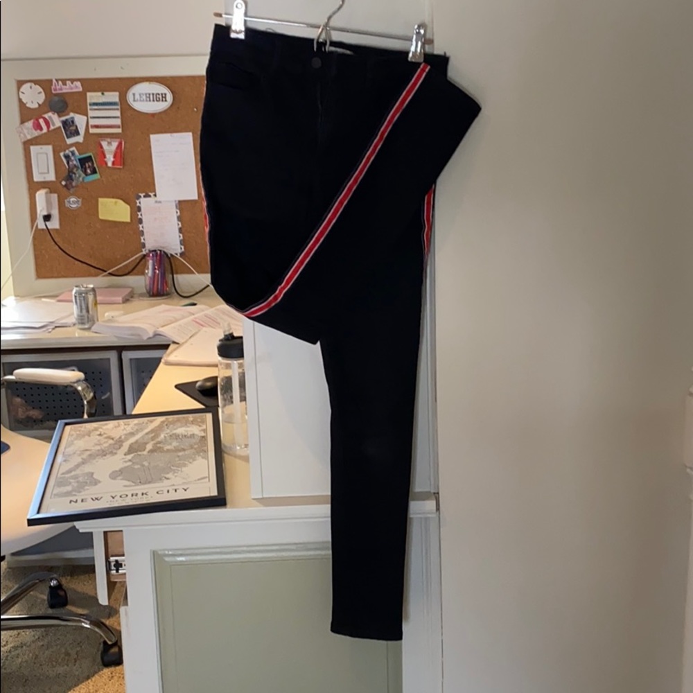 Black jeans with red sides